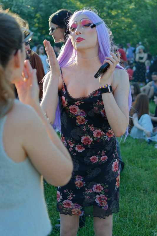 3 - Person dressed for the Pride parade, outdoors in the park